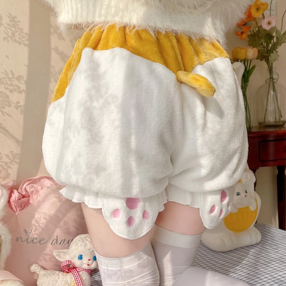 Lifestyle coordinate image featuring white corgi-tail velvet Lolita bloomers paired with coordinated accessories demonstrating versatile sweet lolita styling