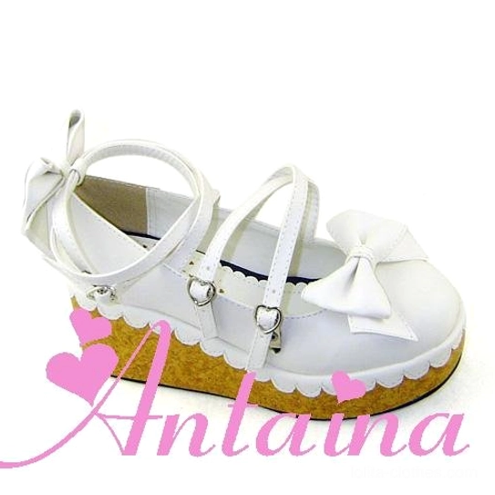 White Lolita platform shoes with dual-color sole featuring white upper material, contrasting platform sole, decorative toe bow, and cross ankle strap heart buckles detail
