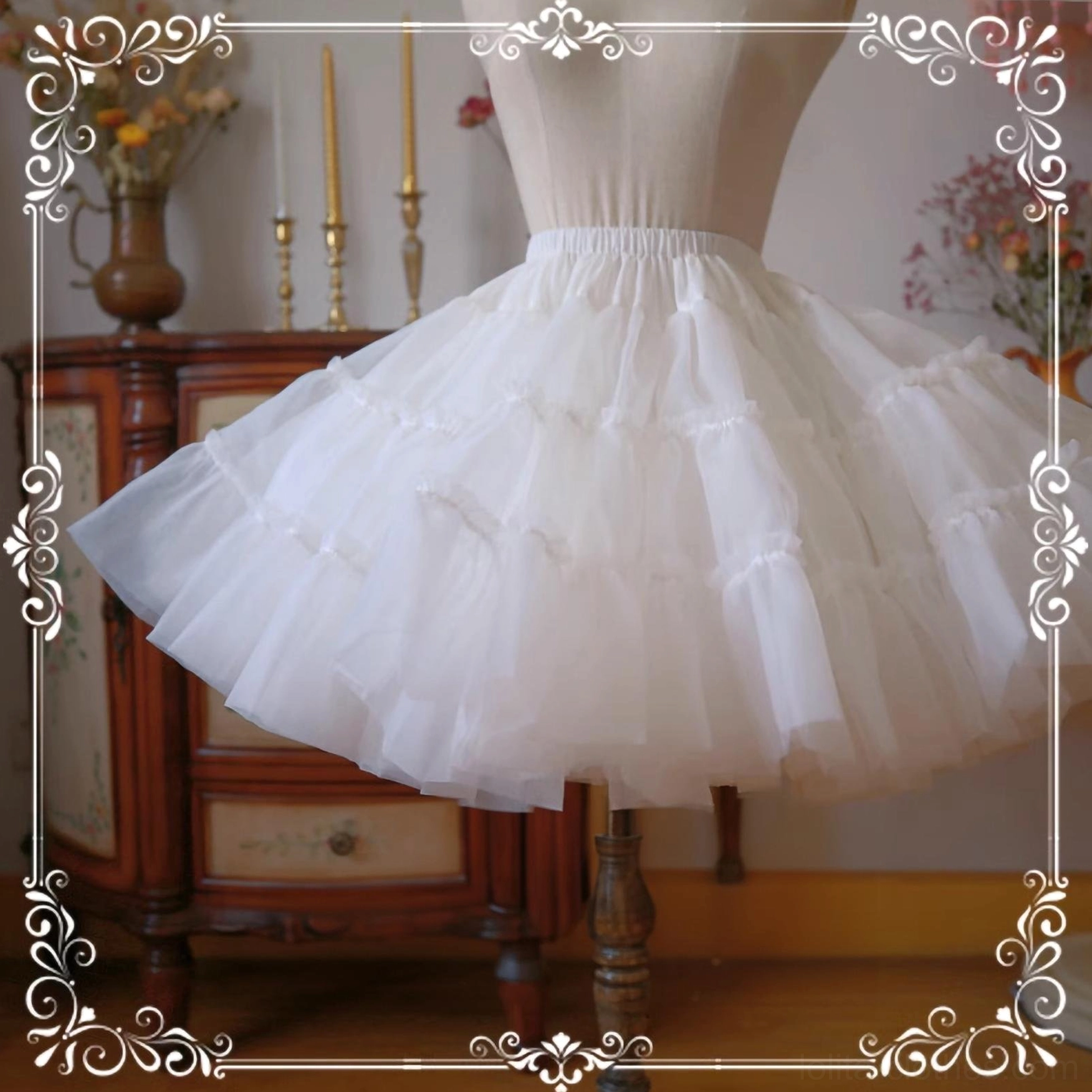 White extreme puffy lolita petticoat side front three-quarter angle on dress form displaying neatly stitched layered tulle ruffles and full silhouette