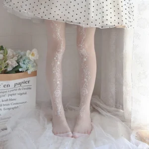 white floral star lolita tights front full view on model wearing polka dot ruffled skirt romantic lolita coordinates