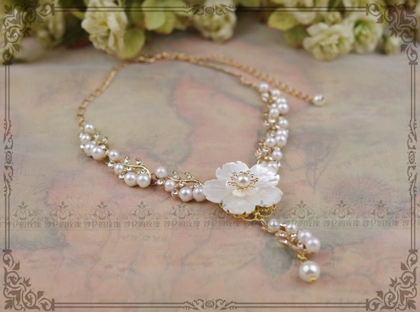 Coordinating white flower and pearl pendant necklace styling inspiration for the Classical Lolita flower ring collection