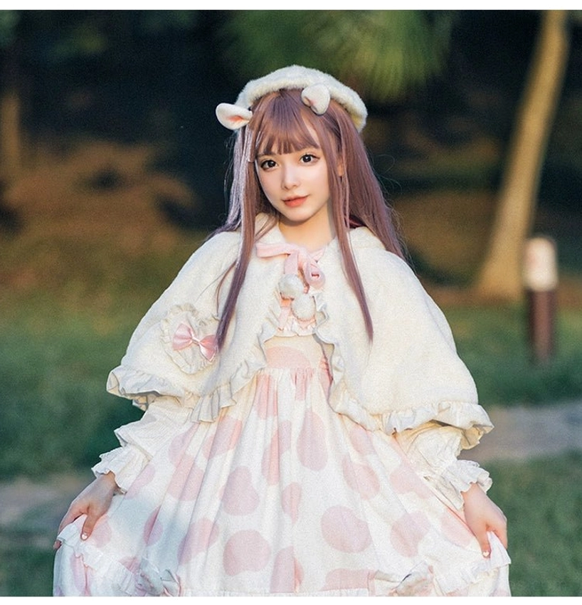 White fluffy D-style Lolita cape with ruffled sleeve cuffs three-quarter side view model light purple hair outdoor park setting