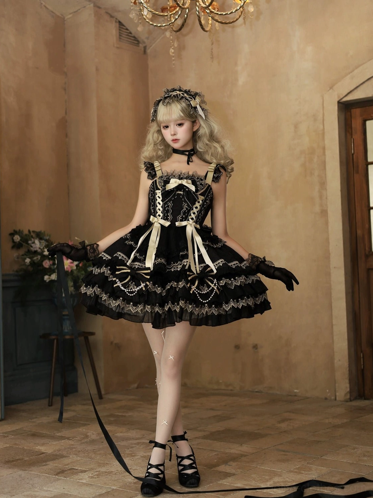 White and gold sweet lolita jumper dress full body front view with tiered ruffled A-line skirt gold lace trims satin bows and Mary Jane shoes