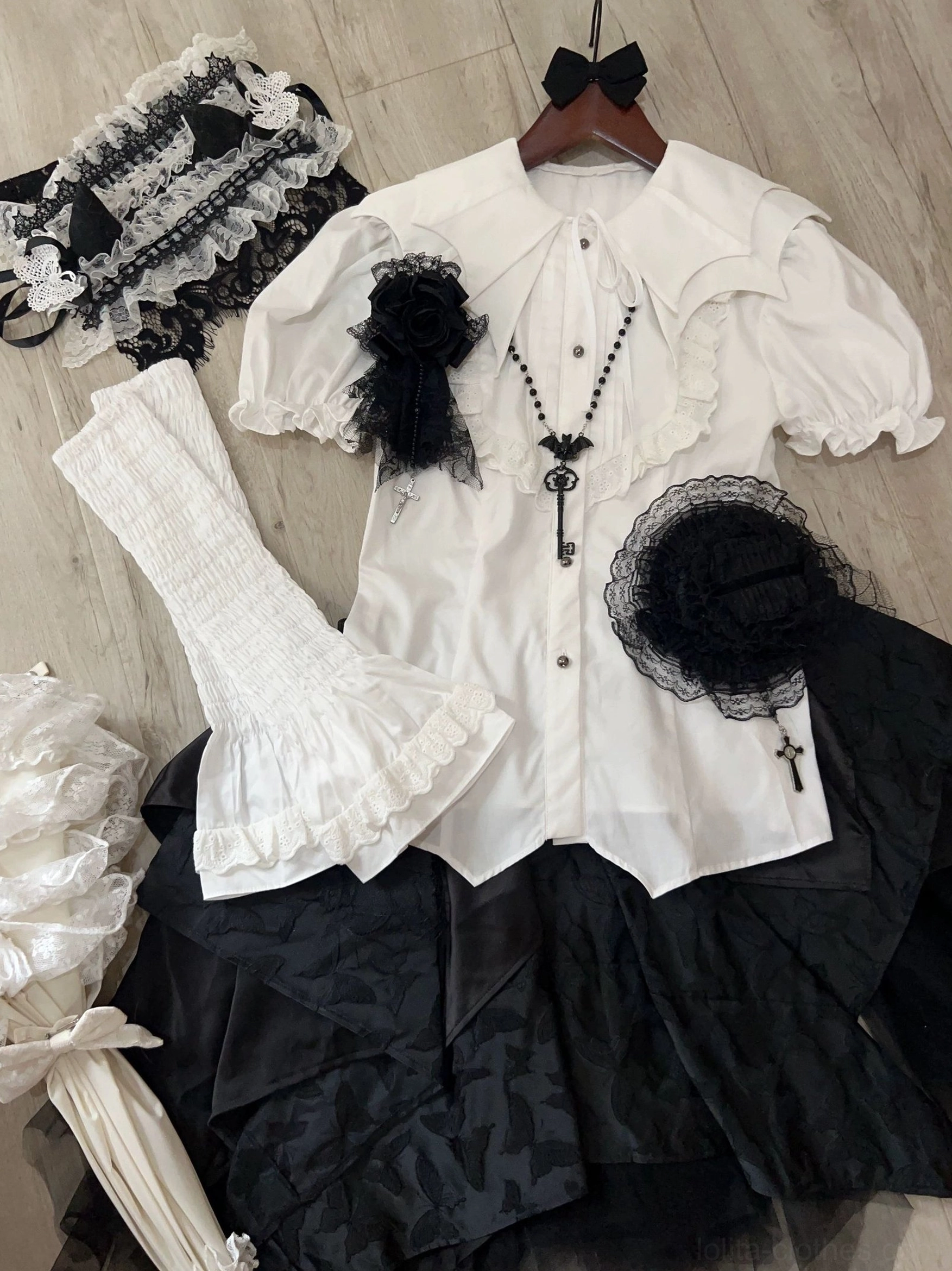White off-white Gothic Lolita bat-collar shirt with detachable jabot - detailed view of fabric texture, collar shaping, and jabot pleating with premium cotton construction
