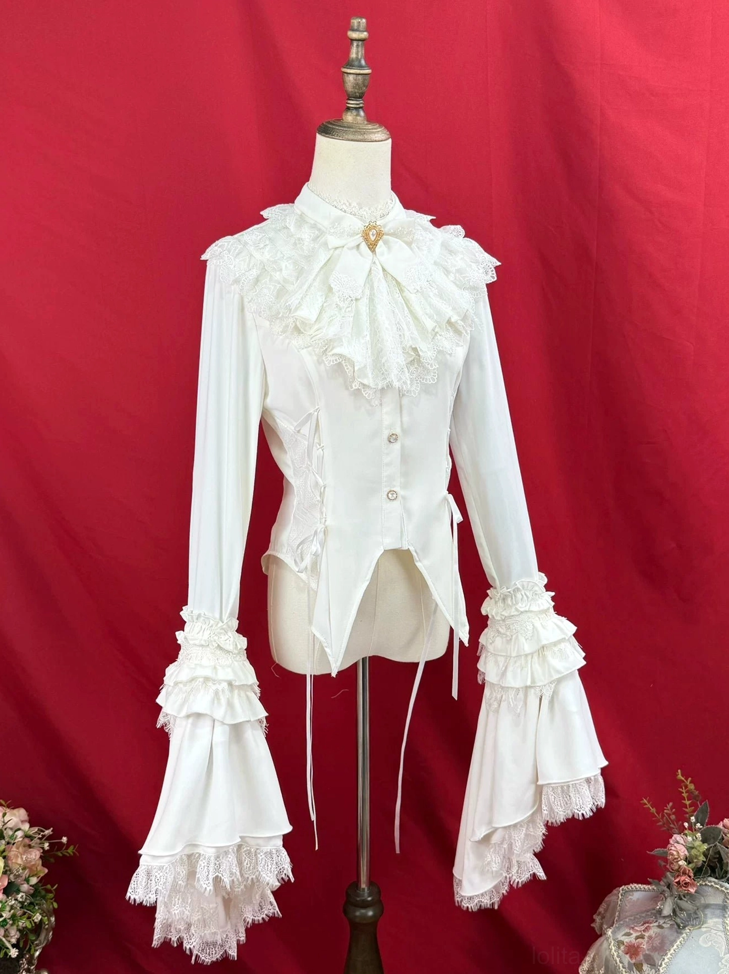 Milky-white Gothic Lolita blouse multi-layer ruffled bell sleeves lace jabot asymmetrical hem detail