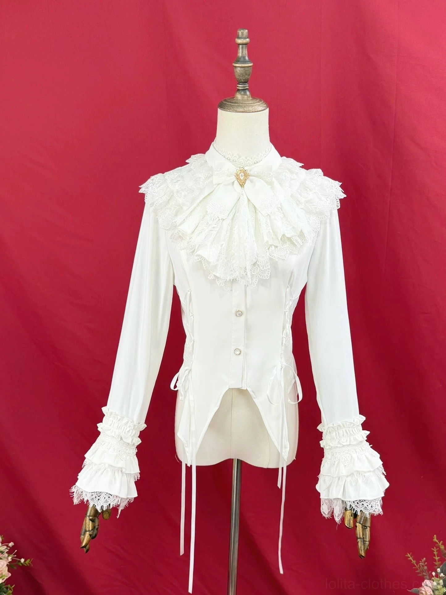 White Gothic Lolita blouse multi-layered ruffled bell sleeves lace jabot asymmetrical hem heart brooch