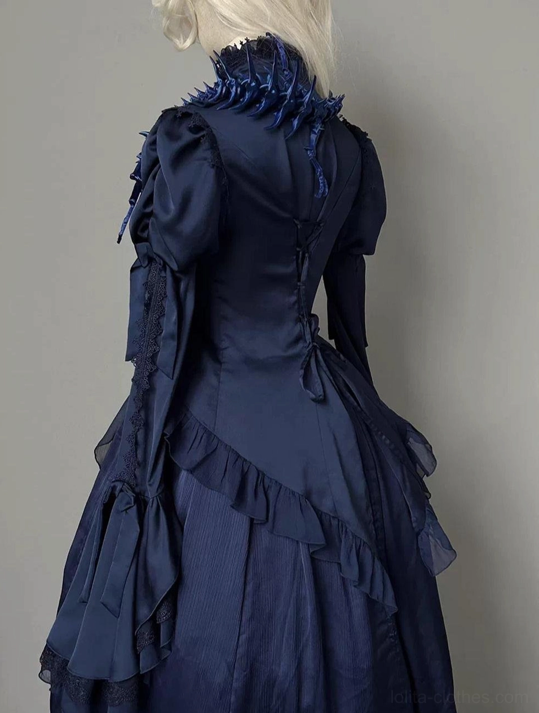 White gothic lolita blouse mannequin display showcasing semi-sheer satin chiffon fabric, layered ruffle details, and elegant sleeve construction with accessories