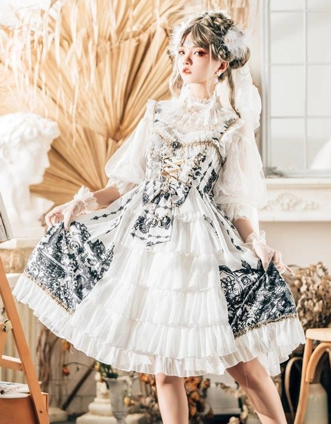 White Dragon Witch Gothic Lolita JSK with matching stand collar inner wear, layered ruffled skirt, and black vintage prints on white fabric
