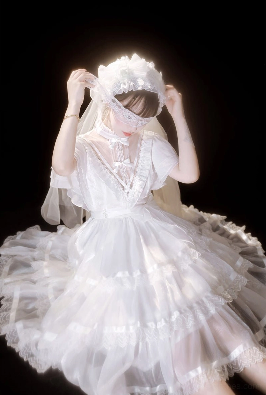 white gothic lolita one-piece dress overhead high angle adjusting veil