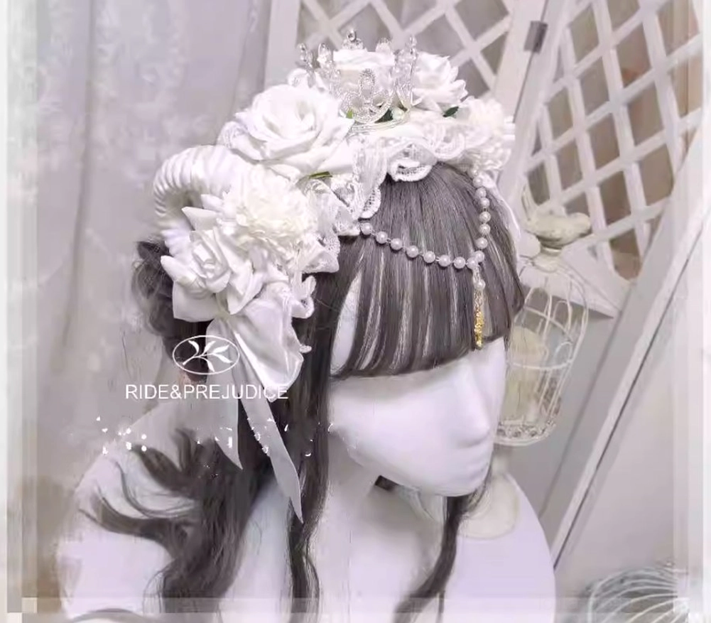 White Gothic Lolita sheep horn crown headdress with full white roses pearl forechain lace headband on gray wig mannequin