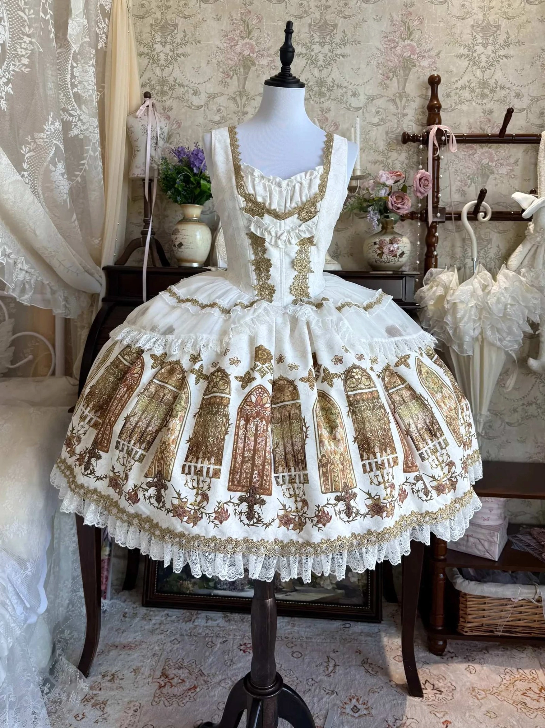 White gothic lolita stained glass print JSK dress with gold embroidered bodice and square neckline vintage display
