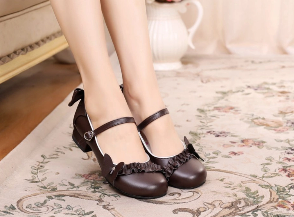 White handmade sweet Lolita Mary Jane shoes with heart buckle paired with white frilly Lolita dress full outfit