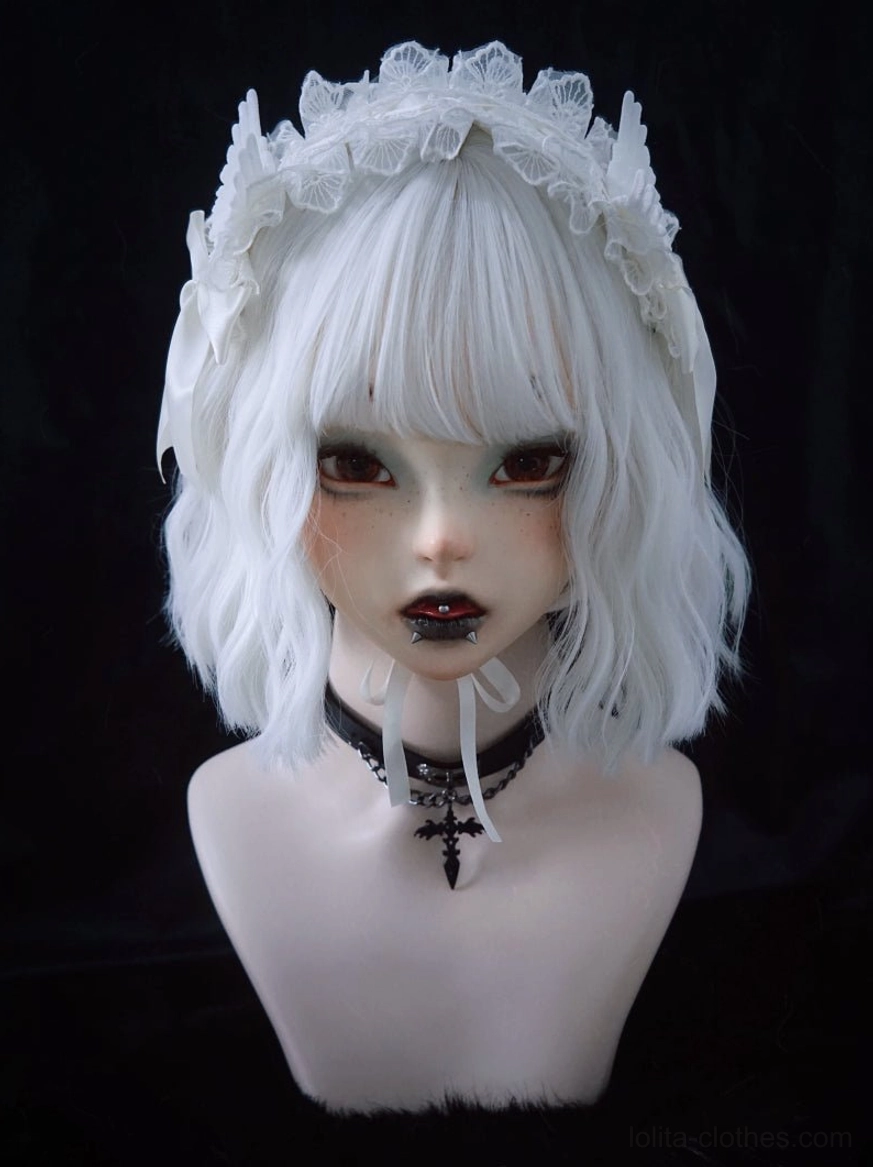 White lace angel wings lolita hairband front direct view on BJD model with cross pendant choker and gothic makeup, full lace trim coverage visible