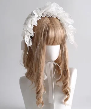 Close-up front perspective of white ruffled lace lolita hair accessory displaying delicate frilled edges and subtle side ribbon details