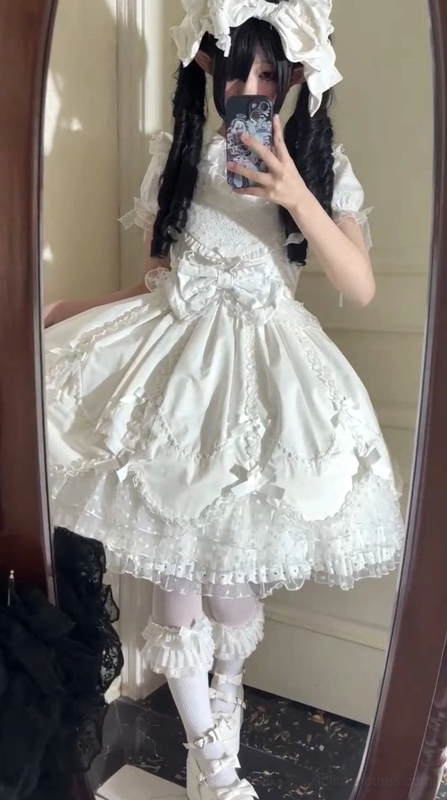 White large KC bow hair clip accessory for sweet Lolita dress with full-size candy detail