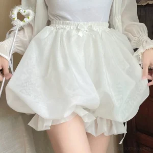 White lolita bloomers front silhouette view displaying puffy bubble hem silhouette and layered ruffles with elasticated waist