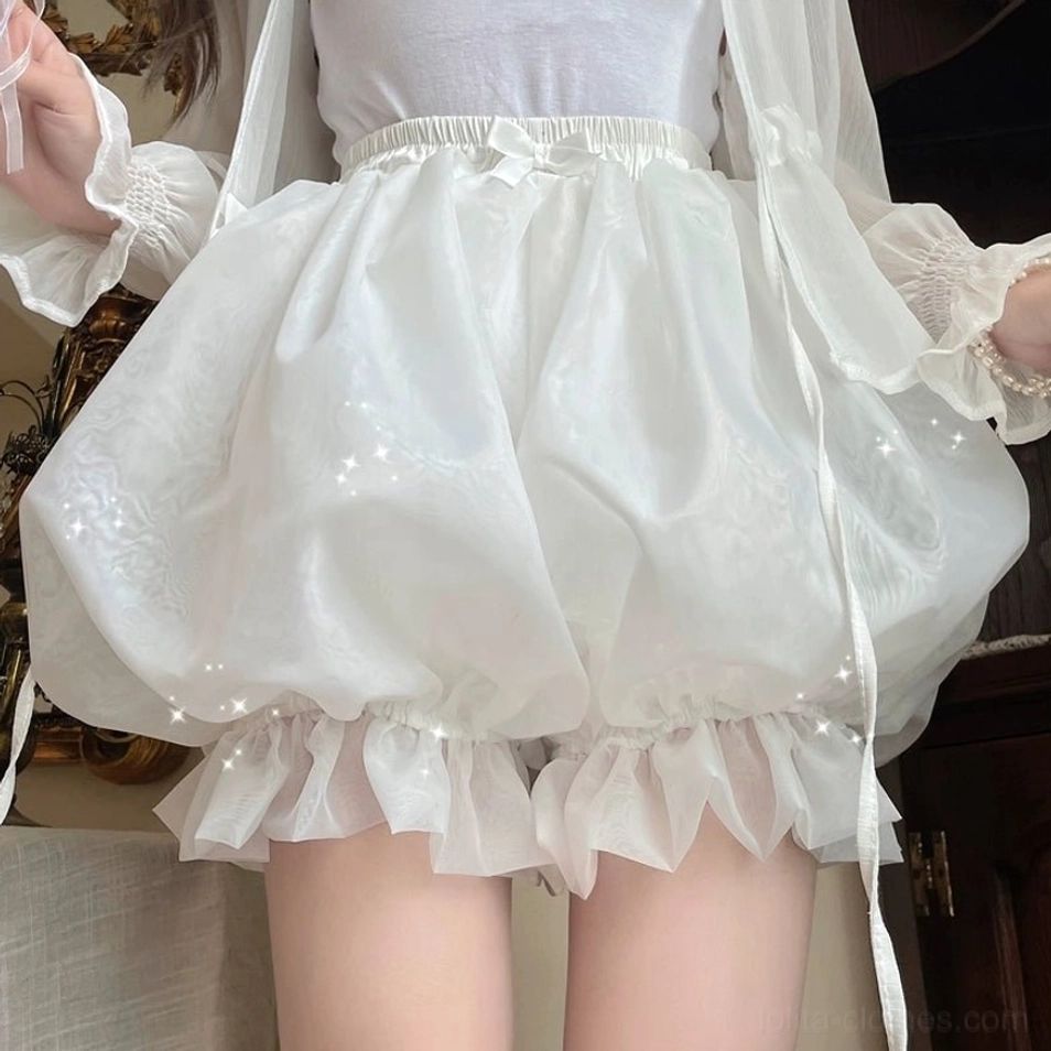 White organza lolita bloomers side view showing elegant puffy silhouette long ribbon drawstrings and delicate ruffled hem construction