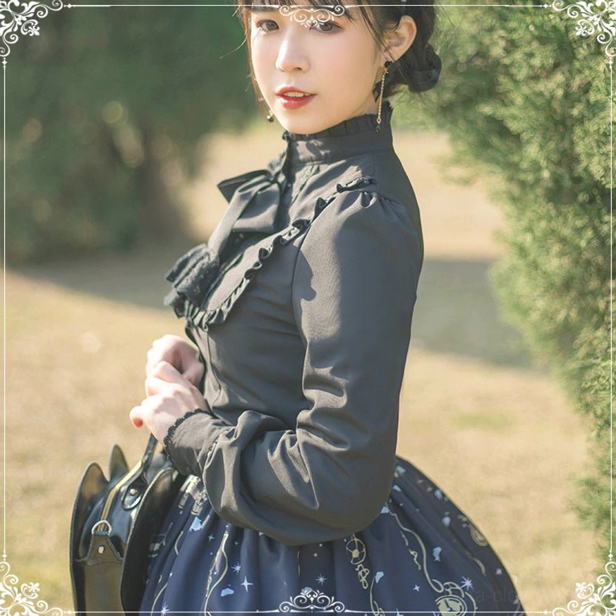 Detail shot of white stand collar Lolita blouse featuring lace trim ruffle collar bow decoration and puff sleeve construction quality