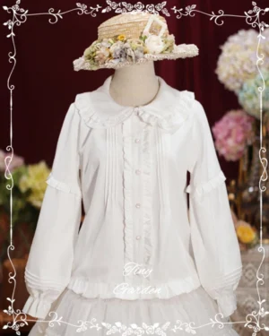 Pure white long-sleeve Lolita blouse with ruffled Peter Pan collar and pin-tuck pleated front, displayed on mannequin wearing floral straw hat against retro backdrop