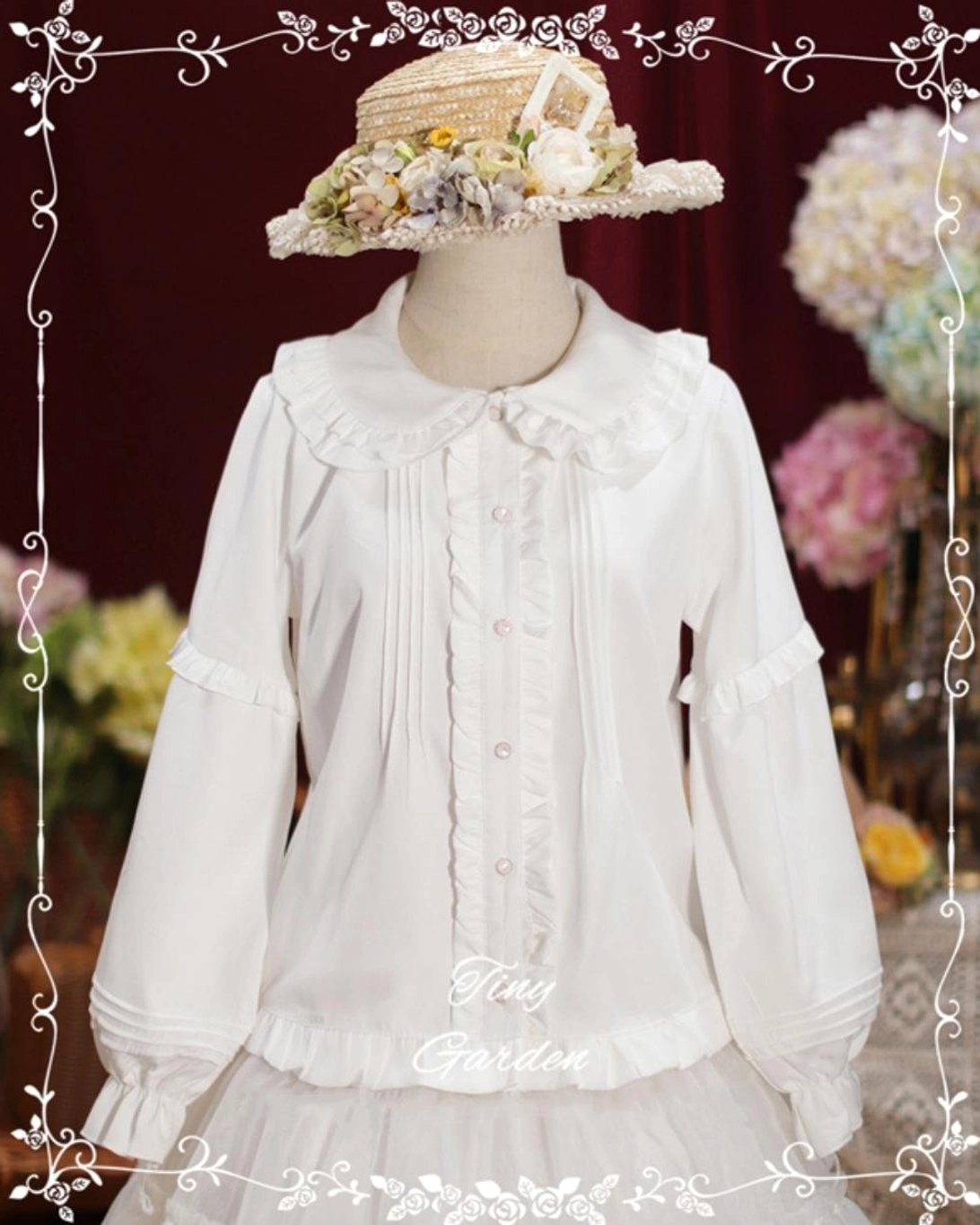 Pure white long-sleeve Lolita blouse with ruffled Peter Pan collar and pin-tuck pleated front, displayed on mannequin wearing floral straw hat against retro backdrop