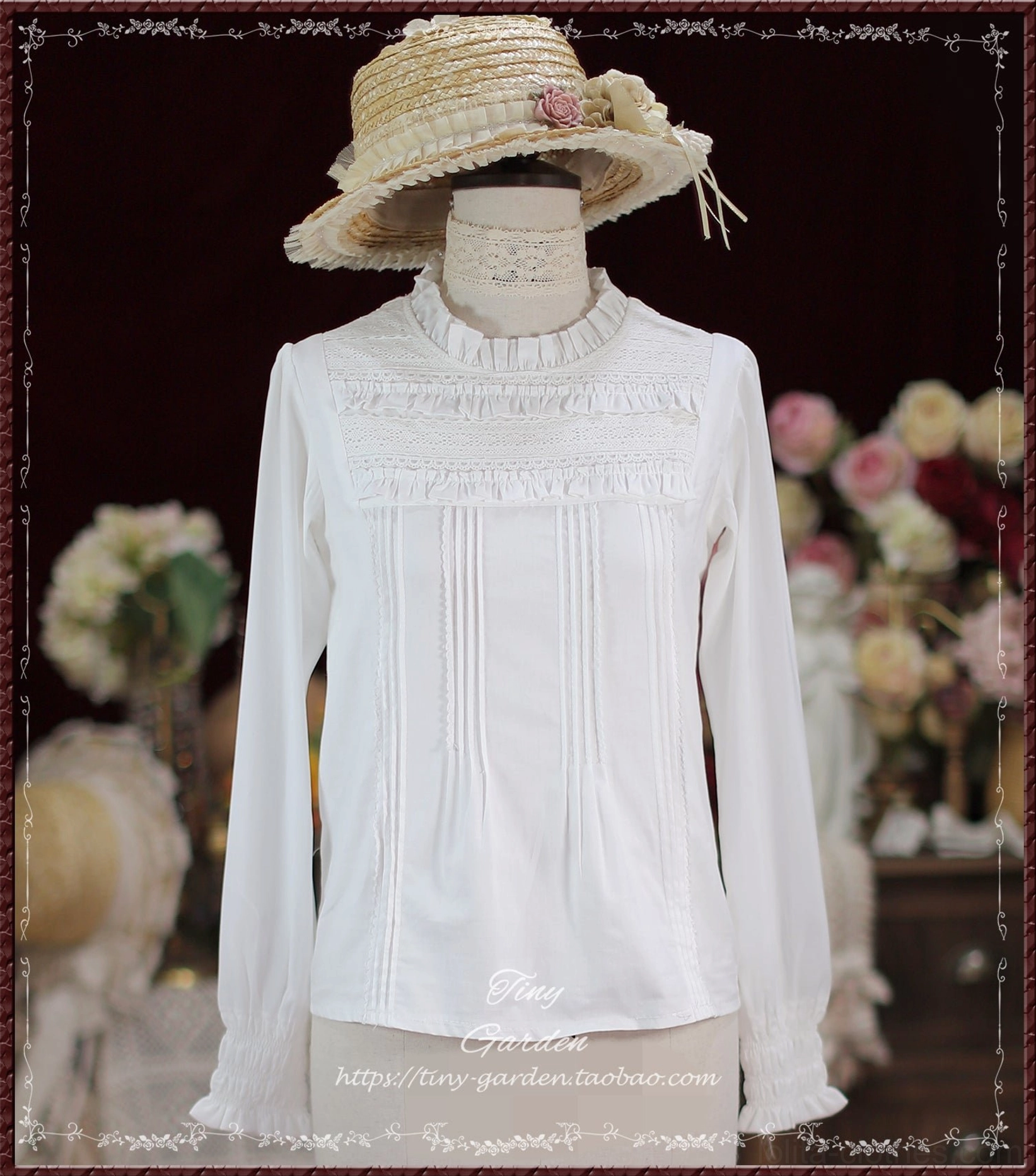 Pure white Lolita long-sleeve blouse with ruffled stand collar, front pin-tuck details, and frilled long cuffs displayed on dress mannequin with flower-decorated straw hat on retro floral background