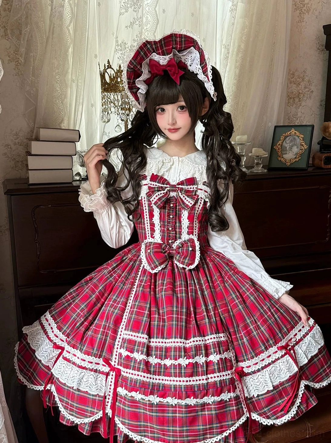 full-body lolita coordinate model wearing white blouse red plaid jsk matching lace bonnet vintage bedroom setting layered hem