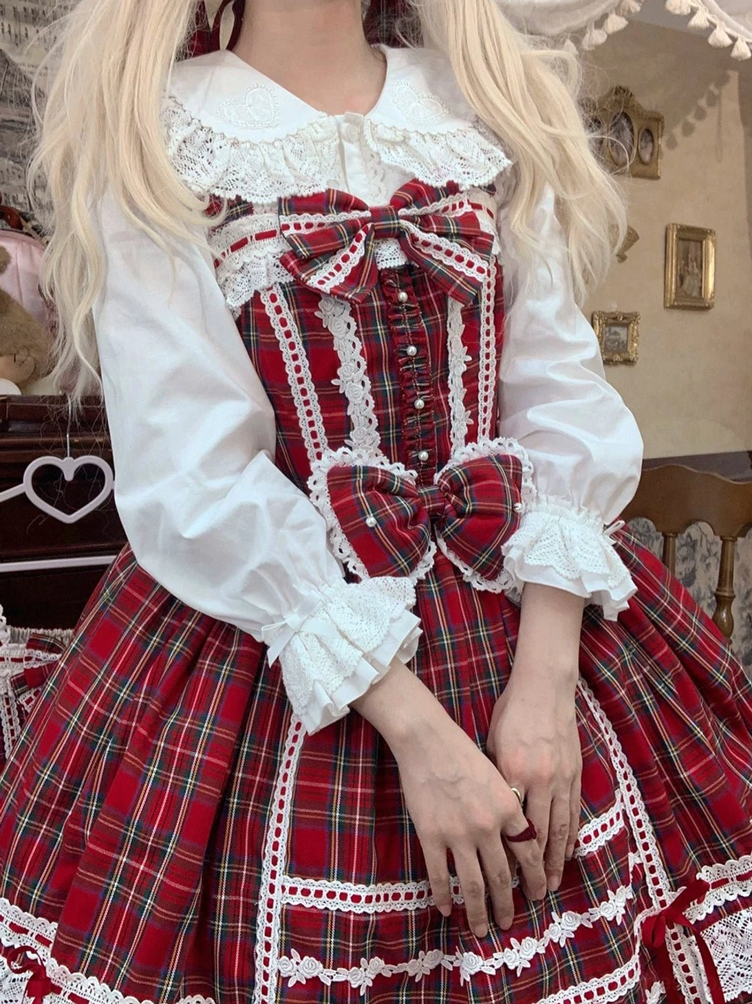 model wearing white kawaii lolita cotton blouse under red plaid tartan lolita jumper skirt sweet coordinate vintage room