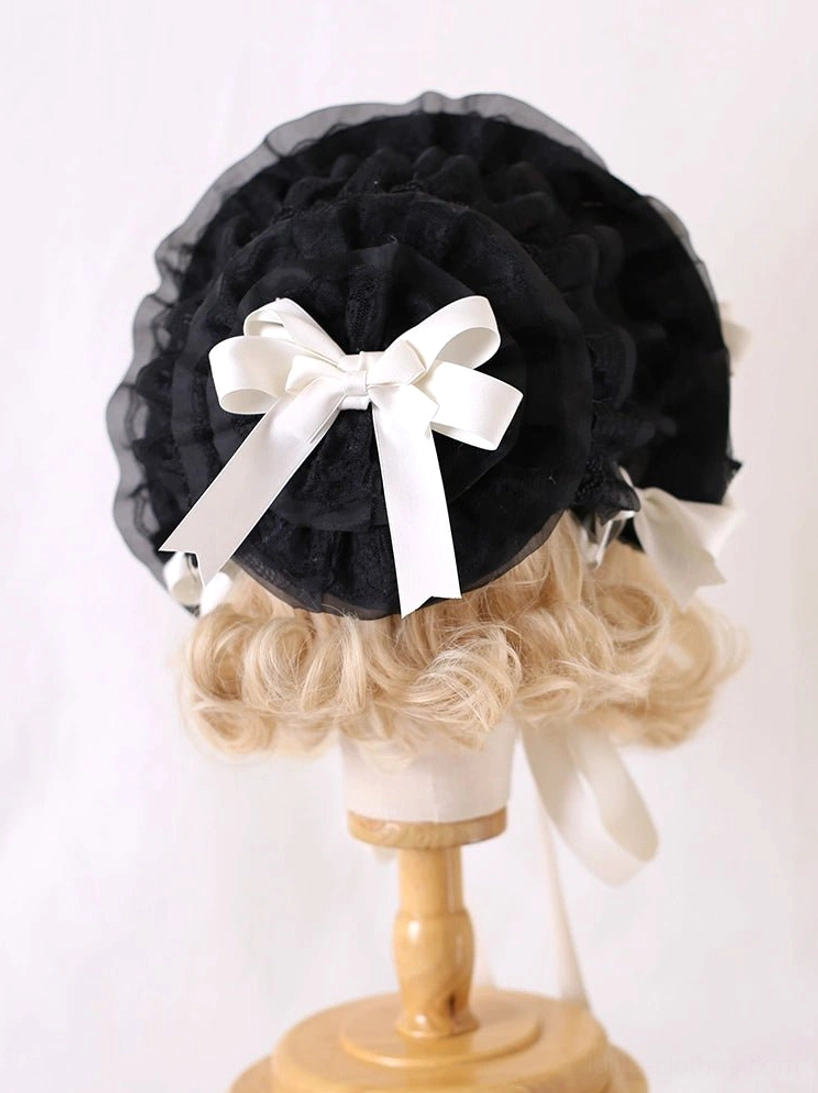Milky white lolita bonnet rear view with large central white satin bow black lace base styling detail
