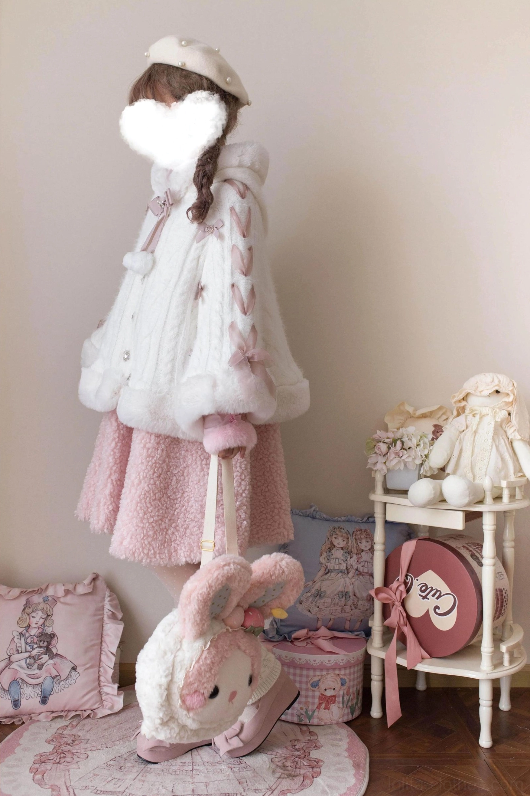 White faux fur lolita winter cape coat full back standing view with plush rabbit shooting prop, styled with pink beret and pink ruffled skirt, plush hem and cuffs
