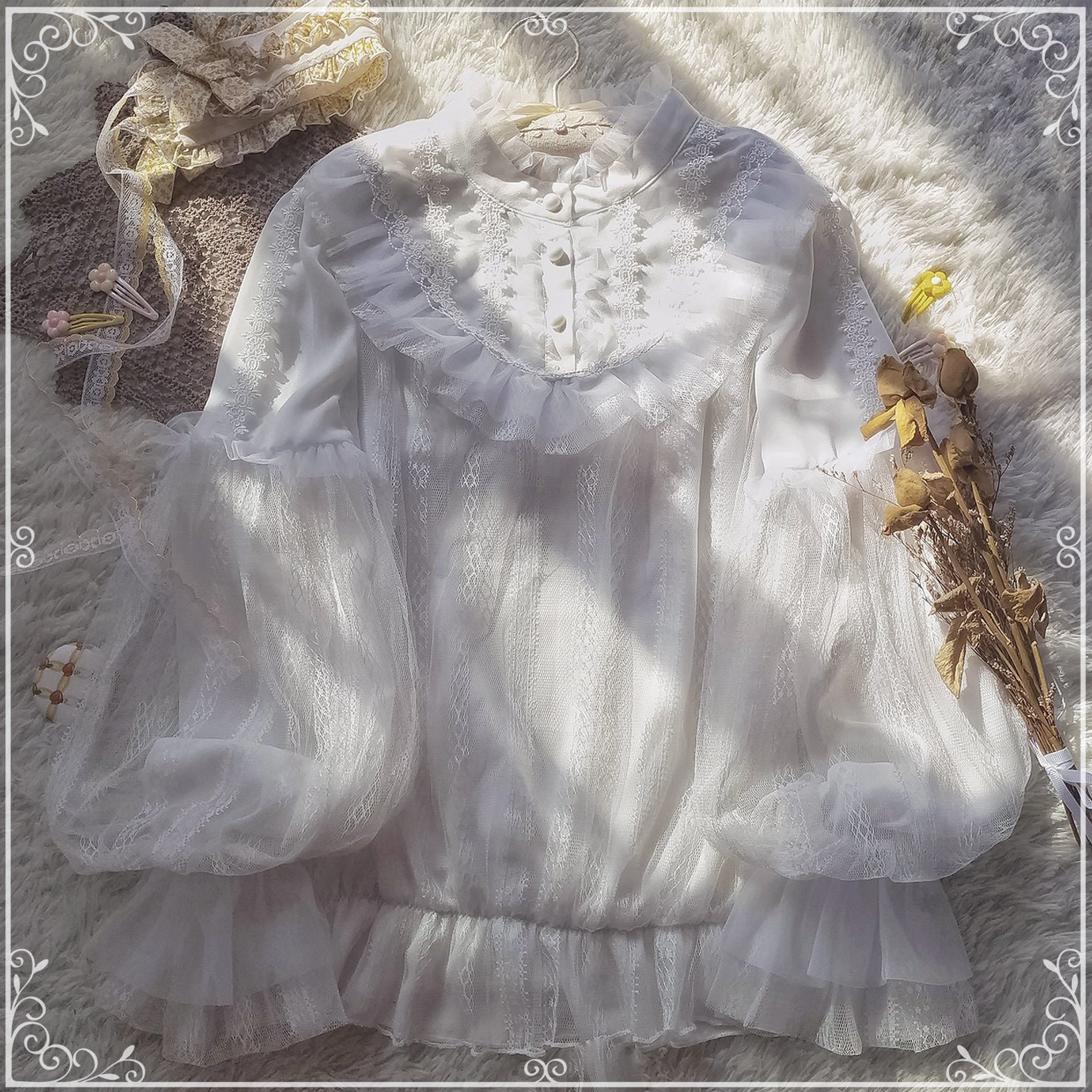 White lolita chiffon blouse with ruffled stand collar and sheer lantern sleeves, featuring embroidered lace trim and front button placket detail on fuzzy background