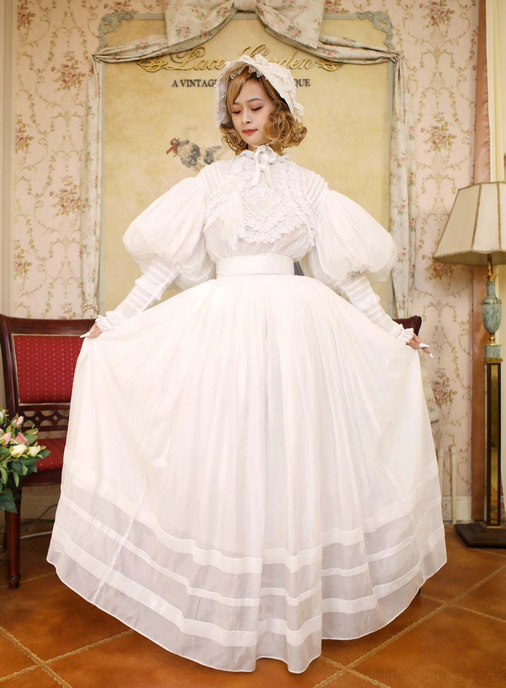 White Lolita set fabric texture close-up showing high-density Tencel material, micro-elastic quality, medium weight construction, and smooth luxurious drape of premium garment