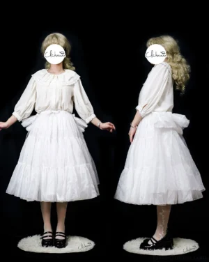 White detachable hip pad lolita petticoat front and side view on female model wearing ruffled blouse black studio background