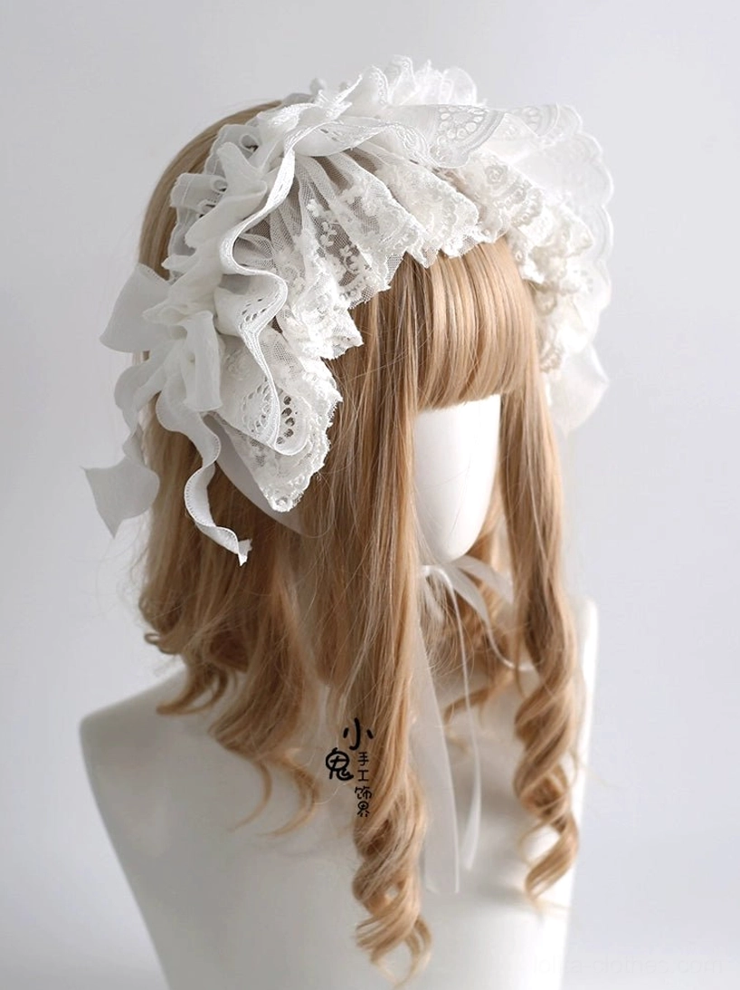 Front three-quarter studio view of white lolita lace hairband with voluminous ruffled trim and elegant bow accents on blonde wig mannequin