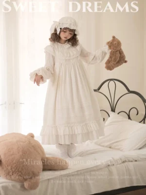 Full front view of ethereal white lolita one-piece dress with ruffled collar, bishop sleeves, and floor-length skirt showcasing the complete sweet lolita aesthetic