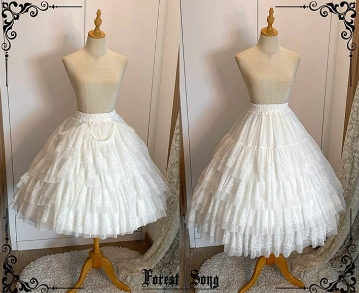 Two white lolita petticoats front view on wooden mannequins featuring soft white lace-trimmed layers creating classic elegant A-line silhouette for sweet lolita