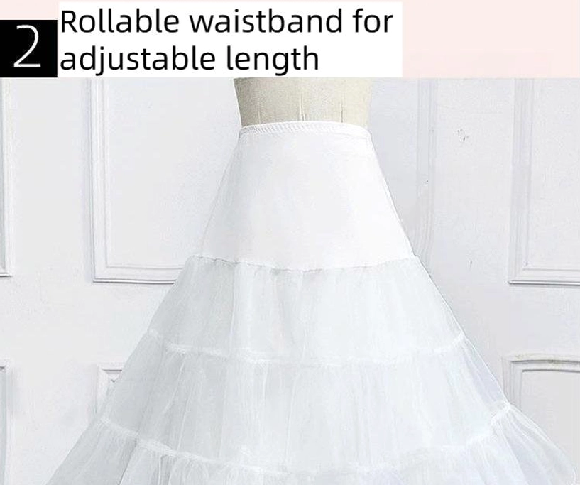 White tiered tulle Lolita petticoat front view on mannequin featuring rollable waistband adjustment and three-layer ruffled construction