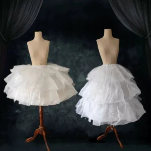 White layered lolita hoop petticoat front display view on wooden mannequin showing tiered ruffled underskirt construction with sheer fabric