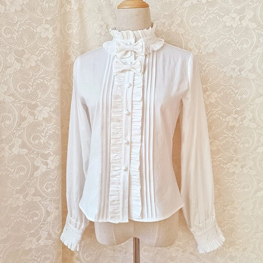 White Victorian lolita stand collar blouse with ruffled placket front full-body view on mannequin