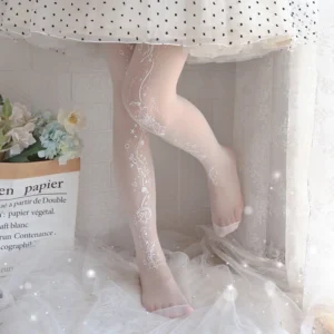 white sheer lolita tights side partial view bent leg showing decorative vine print patterns lolita fashion