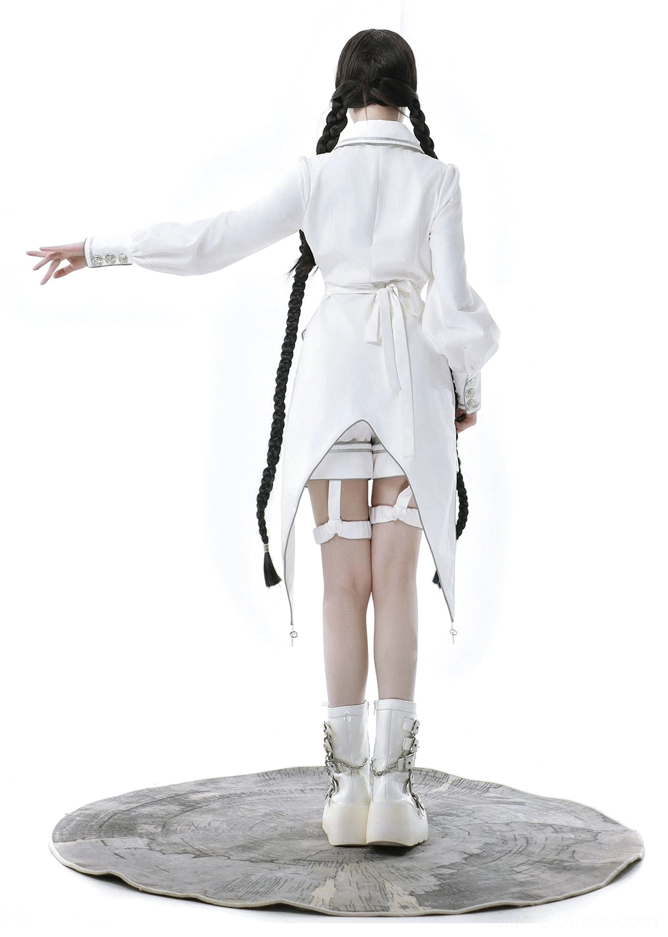 Close-up detail shot of punk ouji lolita white top showing high-neck collar, silver buttons, cross pendant embellishment, and four-pointed star moon embroidery pattern