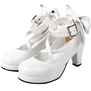 White matte Lolita high heel shoes with crossover ankle buckle straps, oversized back bow, round closed toe, and block platform heel - front oblique angle shot