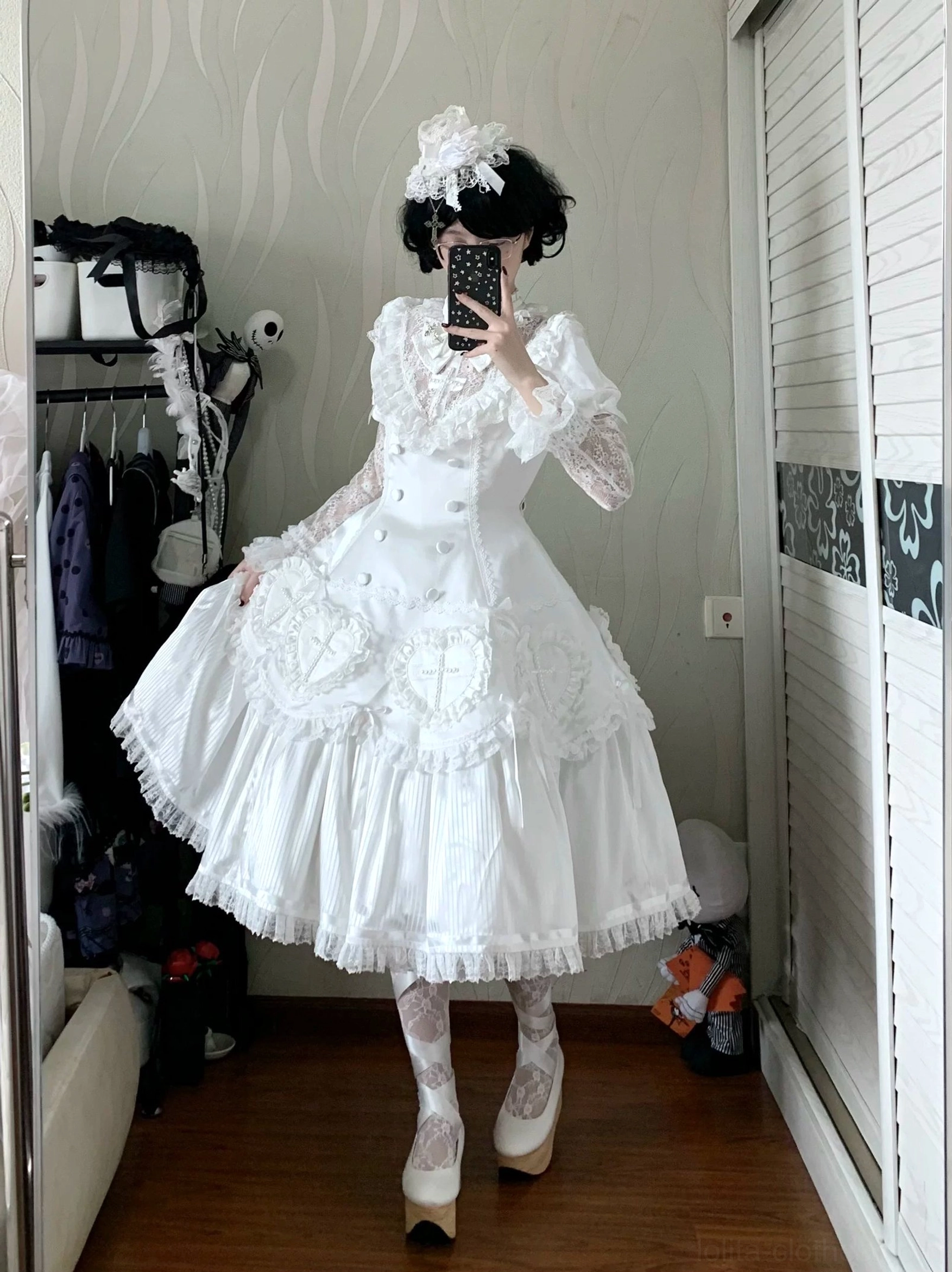 White Nocthymn Cross Gothic Lolita dress with zipper-detachable hem extension showing dual-length versatility short to long conversion