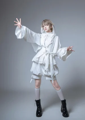 White Ouji Lolita hooded jacket and shorts set full front view with ear-shaped hood ribbons bishop sleeves and waist sash on androgynous model in studio