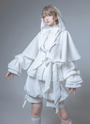 White Ouji Lolita hooded jacket and shorts set three-quarter front view showing front button closures layered capelet hood ruffled cuffs and matching bow tie