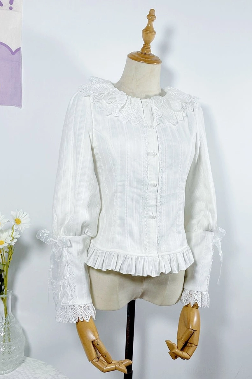 White plus-size lolita long-sleeve blouse featuring lace ruffled round collar, front button closure, ruffled cuffs and hem with vertical striped woven fabric, modeled on dress form in indoor studio