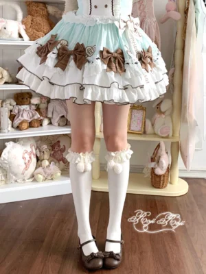 White fluffy pom-pom lolita calf socks with ruffled lace cuffs paired with mint-brown sweet lolita dress and dark brown mary jane shoes front view