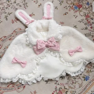 White rabbit ear plush winter Lolita cape with light pink pearl bow and lace ruffle hem flat lay display