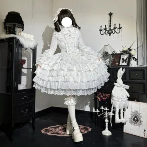 White royal wedding lolita JSK dress with intricate lace embroidery and tiered ruffled skirt, classic royal gothic lolita style full-body front view in dark vintage luxury studio