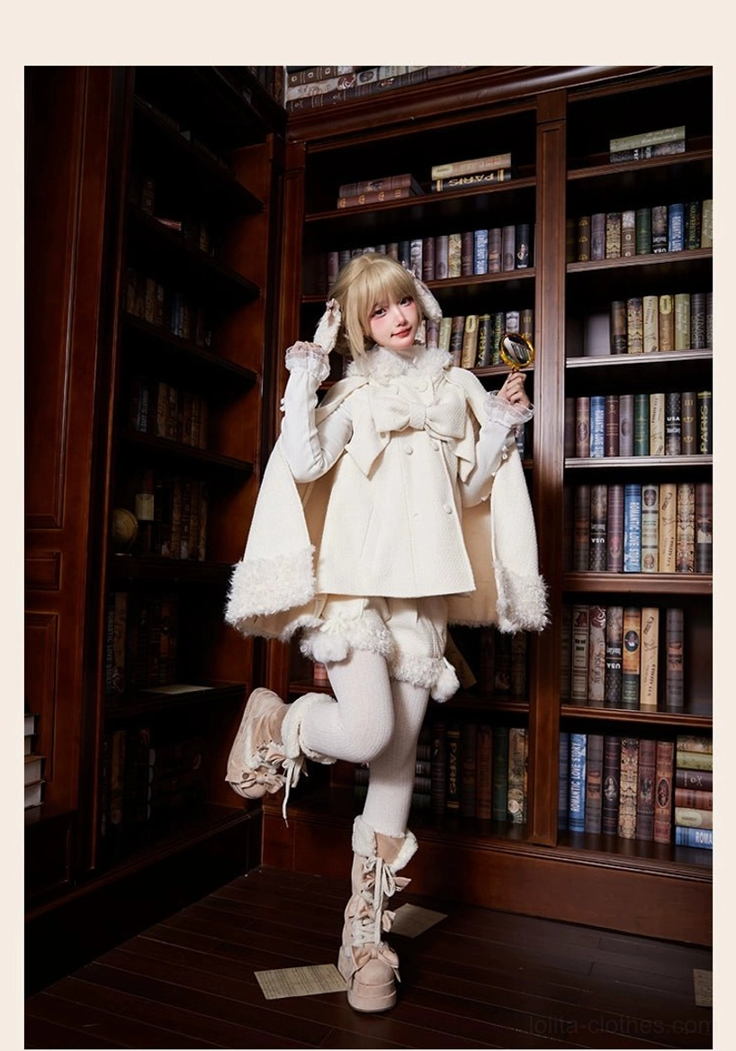Dynamic low angle single model shot wearing white ruffled hem lolita cape with large front bow and frilled shorts, paired with snow boots in retro library study atmosphere