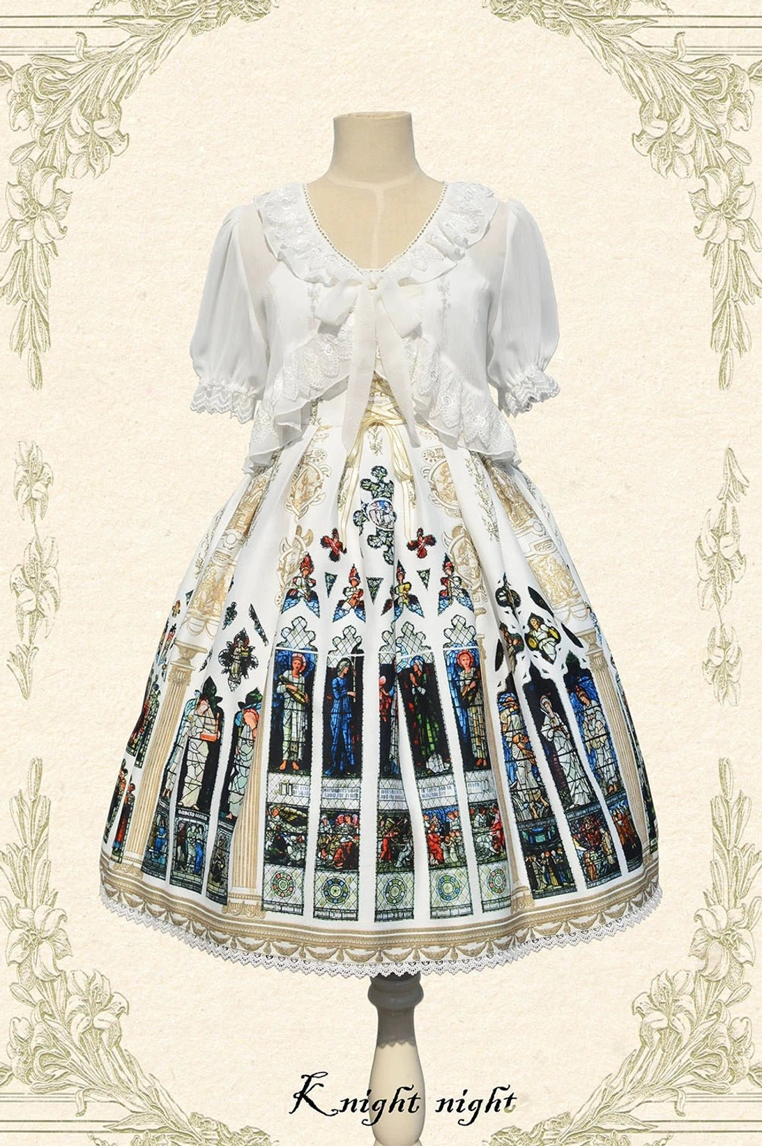 White Saint Priest Lolita full coordinate with Peter Pan ruffled collar bolero, big front bow accent, church stained glass printed full skirt, and golden lace hem on display